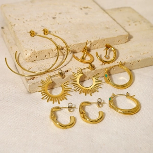 Collection of 18K gold plated titanium C-shaped hoop and sunburst drop earrings set