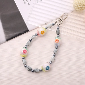 Handmade beaded keychain charm with numeric beads and grey marble texture on silver clasp