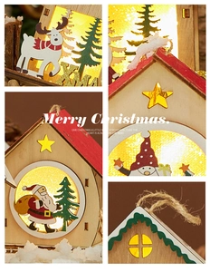 Detailed views of carved wooden Christmas house with LED warm light and jute rope