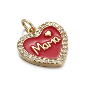 Detail of a gold heart pendant featuring red enamel, MAMA script, and zircon stones