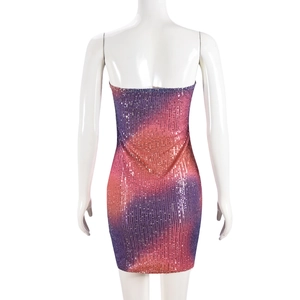 Macro view of horizontal gradient sequins on back of strapless bodycon mini dress