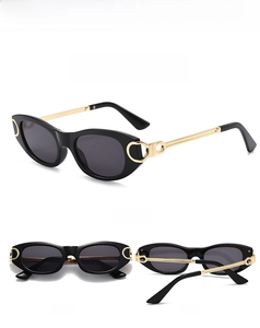 Vues détaillées de lunettes de soleil ovales noires avec branches dorées et verres C1