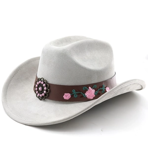 Detail of light gray cowboy hat with pink floral embroidery and vintage buckle