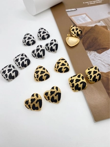 Collection of geometric leopard print earrings in heart, square, and triangle shapes