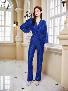 Eleganter dunkelblauer Pailletten-Jumpsuit mit V-Ausschnitt und langen Ärmeln für Feste