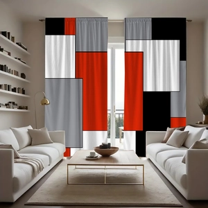 Detailed view of modern geometric patterned curtains in red, black, and gray for living room