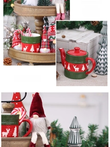 Detailed view of Christmas elk ceramic tea set with festive gnome fabric doll decor