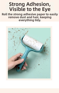 Detail showing hand-held lint roller with sticky paper cleaning debris on fabric