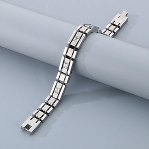 Detailed view of industrial titanium steel bracelet with three square-cut zircon stones