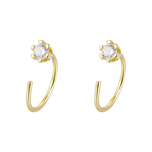 Minimalist gold zircon hoop earrings with a six-prong crown setting on a clean white background