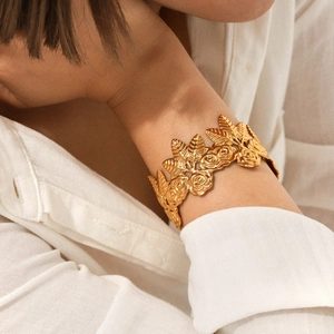 Exaggerated 18K gold plated wide cuff bracelet featuring vintage floral rose carvings