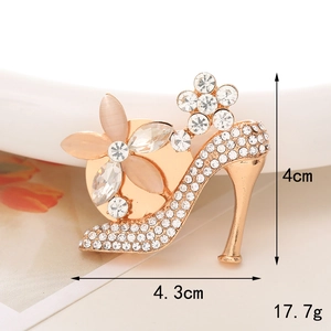 Cat eye stone high heel accessory with rhinestones shown with 4cm by 4.3cm dimensions