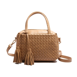 Camel woven handmade square handbag with dual handles and tassel charm in gold hardware