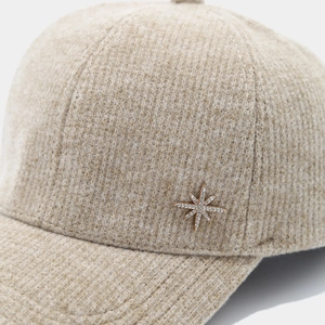 Chic beige wool baseball cap for women with a sparkling crystal star emblem detail