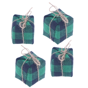 Detailed view of four blue and green plaid fabric gift box ornaments with jute twine ties