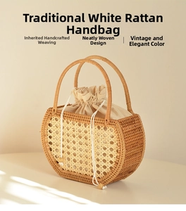 Detail of hand-woven white rattan bag with semi-circular structure and soft beige lining