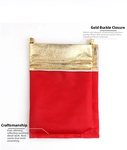 Detail of red and gold velvet jewelry pouch with elegant gold metallic drawstring closure
