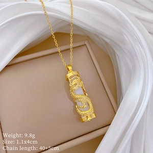 Detailed view of dragon-wrapped cylinder necklace with crystals and product specifications