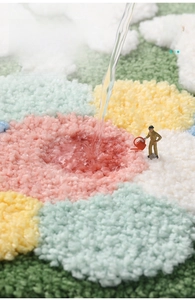 Close-up of fluffy floral bath mat fibers absorbing water to show high density and texture
