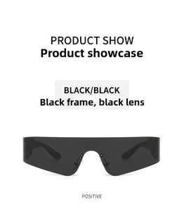 Close-up of black rimless futuristic sports sunglasses with one-piece wrap lens