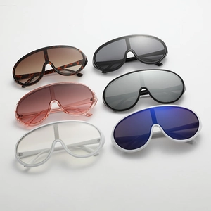 Multiple colors of oversized Y2K shield sunglasses with streamlined wrap design