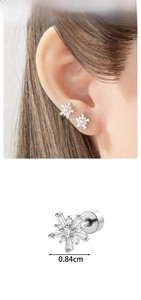 Macro view of snowflake ear stud with cubic zirconia and screw back detail, 0.84cm size