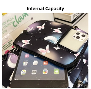 Detail view of the spacious inner capacity of the butterfly print backpack with a tablet