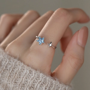 S925 sterling silver open ring with sea blue star zircon stones on model hand