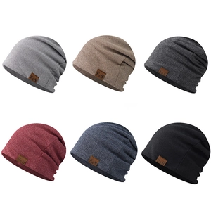 Breathable cotton beanie hats in six colors with leather logo patches for men and women