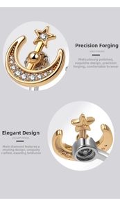 Detail of star and moon spinner ring featuring rotating white zircon and gold plating