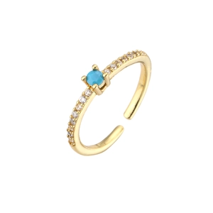 Adjustable gold plated ring with turquoise center stone and micro pave zircon accents