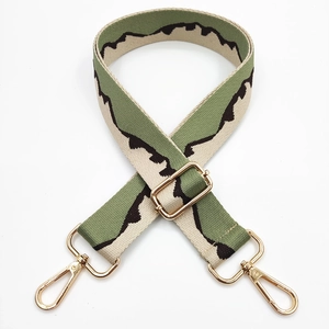 Adjustable woven jacquard shoulder strap with green pattern and gold metal hardware