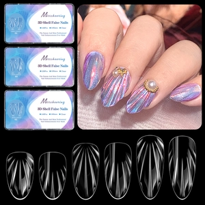 Detailed view of clear 3D shell textured almond nail tips and professional packaging set