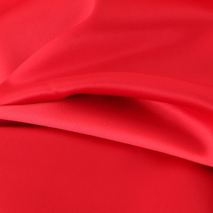 Elegant red satin fishtail evening dress featuring a lace-up back and sexy bodycon silhouette