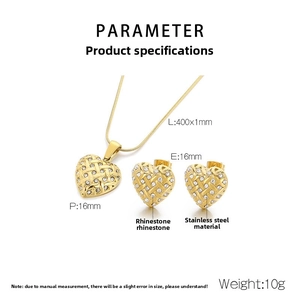 Close-up of golden stainless steel heart jewelry set with woven texture and rhinestones