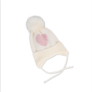 Detailed knit texture of cream baby hat with pink heart pattern and soft white pompom