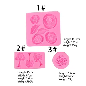 Pink silicone fondant mold set with rose, leaf, and tree patterns for cake decorating