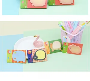 Close-up of cute cartoon animal sticky notes including elephant cat and rabbit patterns