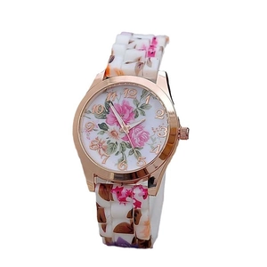 Classic Geneva style rose gold watch featuring pink floral print dial and matching strap