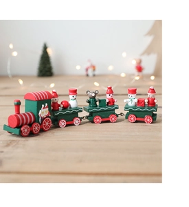 Detailed close-up of a wooden Christmas train toy with snowman and Santa figures