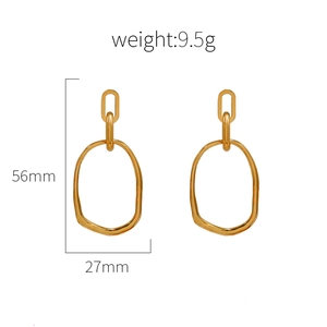 Exaggerated oval titanium steel earrings in gold finish, dimensions 56mm by 27mm