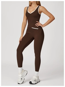 Detailed close-up of high-waisted yoga set with crossover V-waist and contrast trim