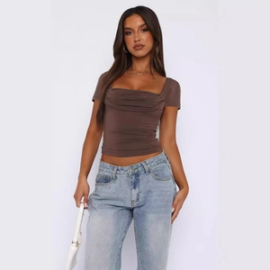 Women's slim fit short sleeve T-shirt with stylish brown ruched design in studio shot