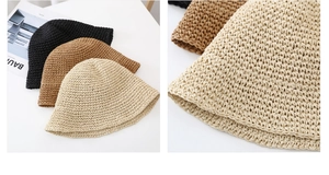 Detailed close-up of woven sun hats showing fine straw texture and stitching craftsmanship