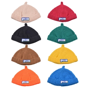 Toddler knitted beanie collection in eight vibrant colors with Plig woven label decoration