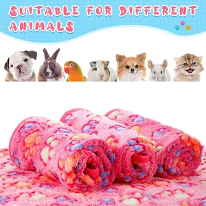 Soft pink flannel pet blanket with colorful paw prints suitable for various small animals