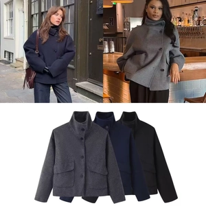 Detail view of mock neck buttoned wool coat in grey, navy blue, and black colors