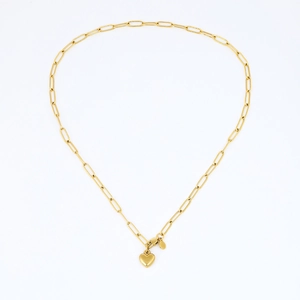 Close-up of golden paperclip chain bracelet with a 3D solid heart pendant and clasp