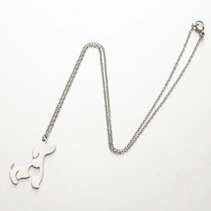 Chic silver dog pendant necklace for women with minimalist animal charm on white background