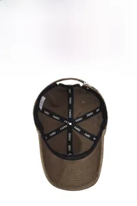 Close-up of brown cotton baseball cap interior showing FARD logo tape and metal buckle
